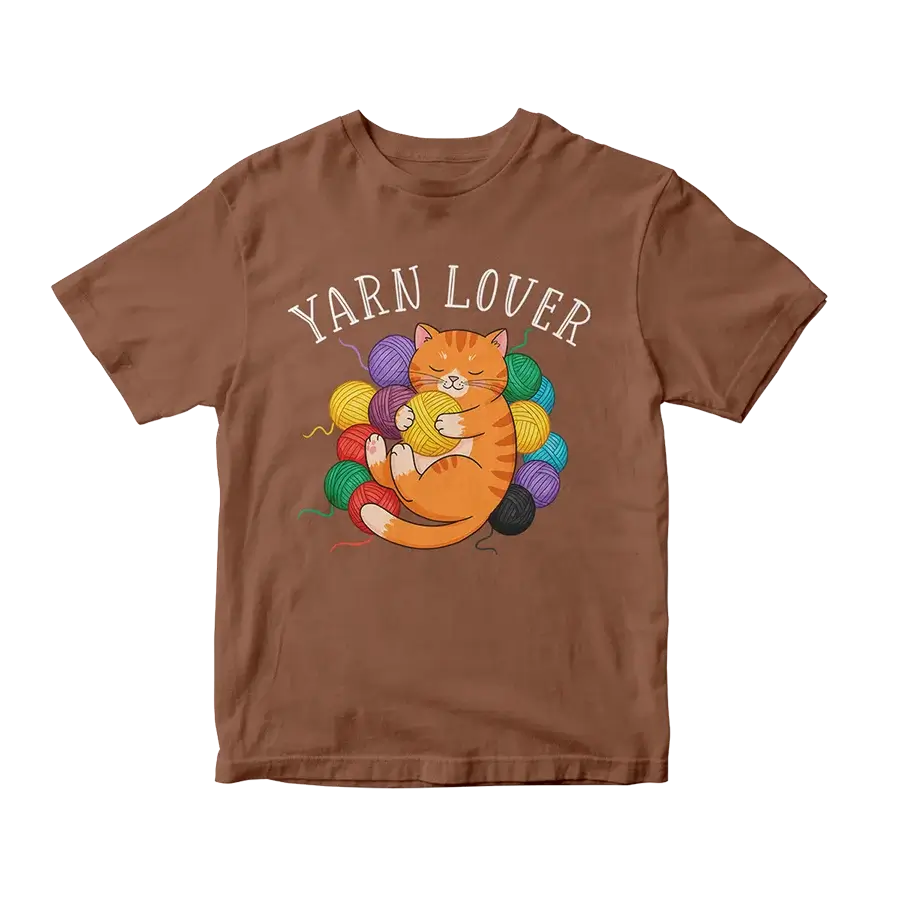 Direct-to-Film (DTF) transfer applied on a brown t-shirt, showing a cat with yarn and 'Yarn Lover' slogan.