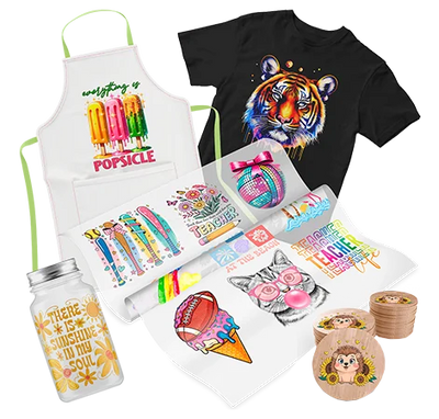 Assorted custom crafts and apparel featuring colorful prints, including popsicle apron, vibrant tiger shirt, mason jar quote, teacher-themed graphics, and playful ornaments for DIY projects.