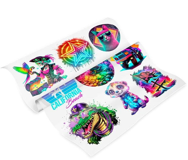 Custom DTF transfer gang sheet featuring vibrant illustrations of a pirate girl, neon stars, a cool crocodile, and retro cat graphics for multi-product apparel branding.