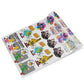 Rolled DTF Gang Sheet with multiple colorful cartoon designs.