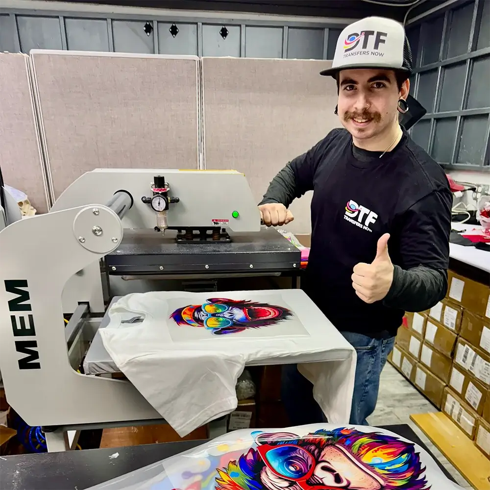 Applying DTF transfer with heat press on a t-shirt